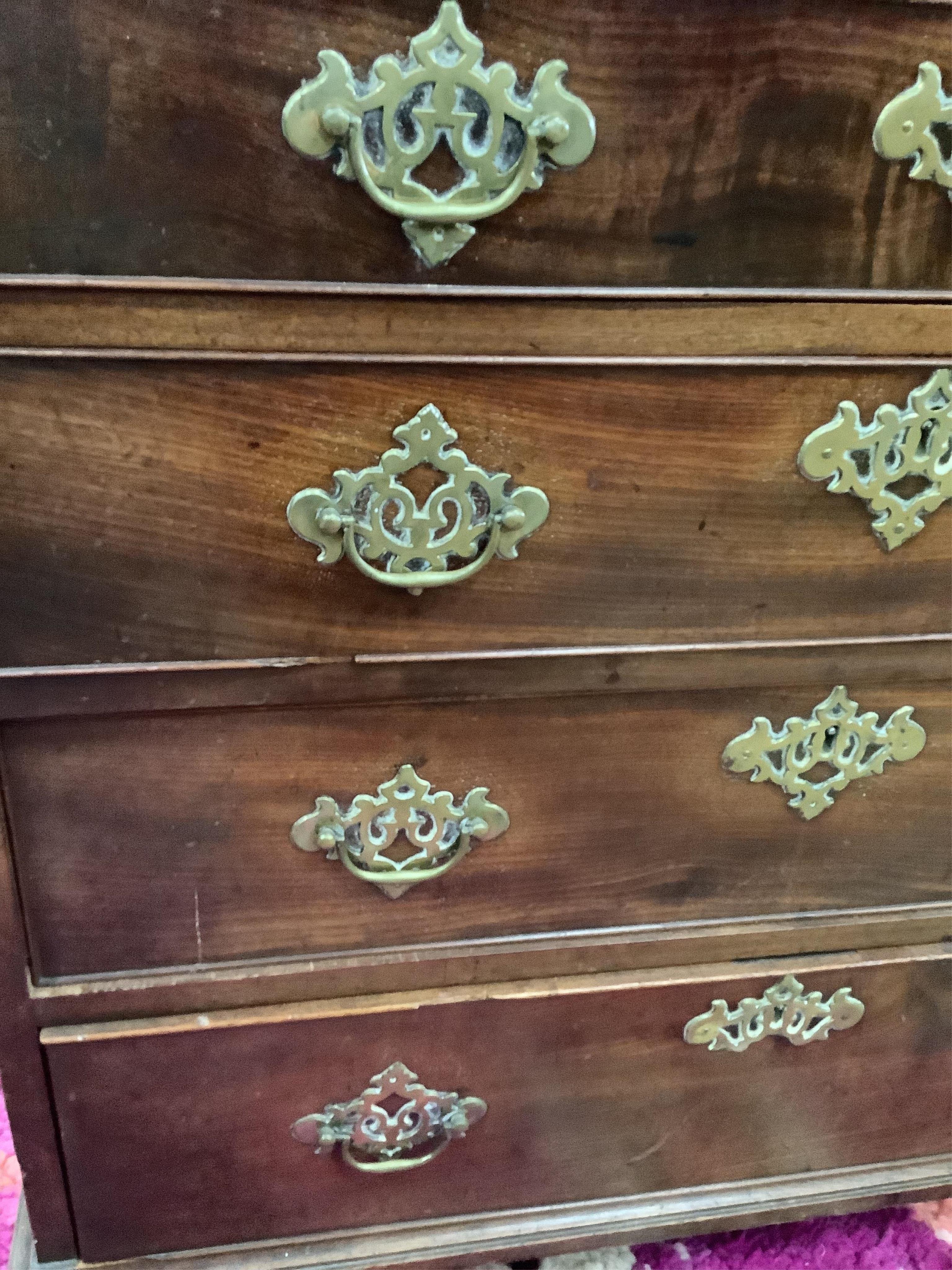 A small George III mahogany chest, fitted four long drawers, beneath a brushing slide, width 80cm, depth 49cm, height 81cm. Condition - fair